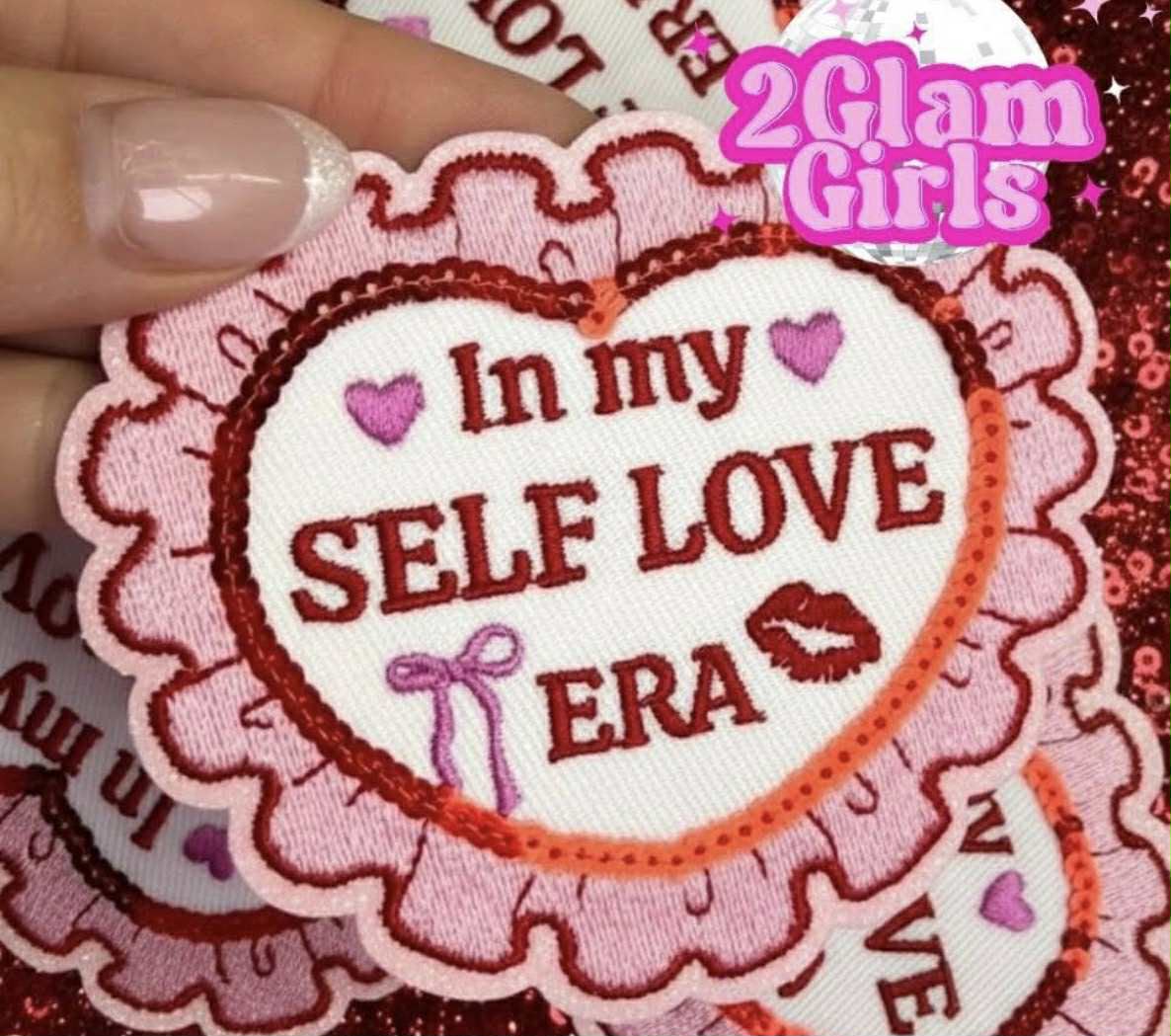 Pink scalloped heart embroidery patch with 'In my self love era' lettering
